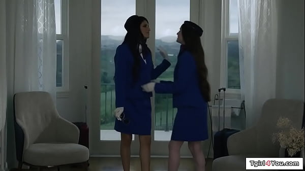 Trans flight attendant Zariah Aura fucks her busty coworker